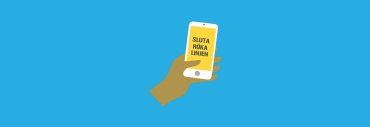 en hand håller i en mobiltelefon där det står Sluta-röka-linjen på skärmen