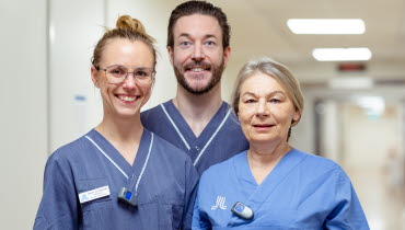 Tre skötare i bredd