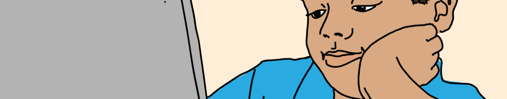 Pojke tittar på datorskärm