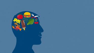 Illustration av ett huvud där hjärnans yta är täckt av grönsaker, glass och andra matvaror. 